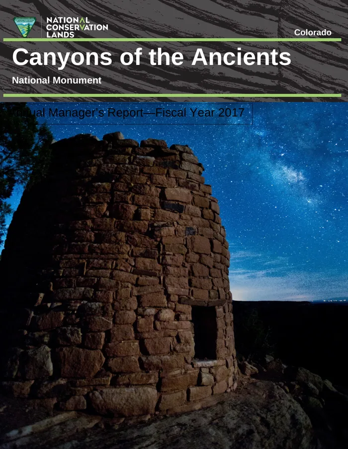 Cover of the Canyons of the Ancients Annual Manager's Report 2017 — an ancestral stone tower under the night sky